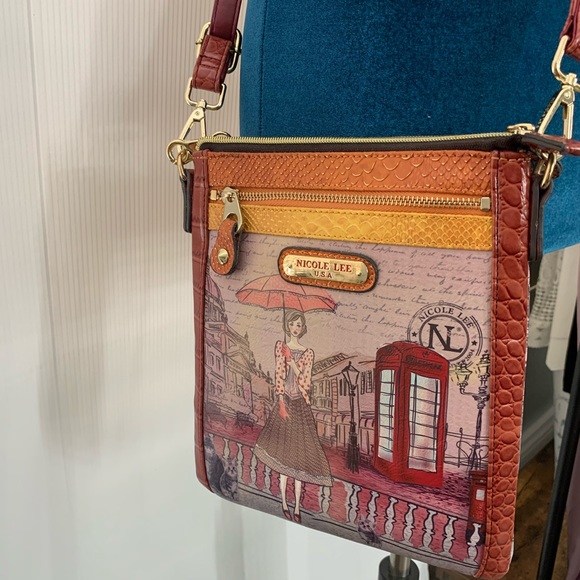 Nicole Lee Handbags - NWOT Unique Nicole lee cross over bag